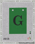 A taped needlepoint canvas with the design: Banner 18 mesh count Squared G Black on Green.