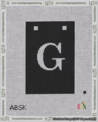 A taped needlepoint canvas with the design: Banner 18 mesh count Squared G White on Black.