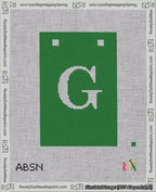 A taped needlepoint canvas with the design: Banner 18 mesh count Squared G White on Green.