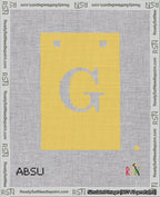 A taped needlepoint canvas with the design: Banner 18 mesh count Squared G White on Yellow.