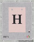 A taped needlepoint canvas with the design: Banner 18 mesh count Squared H Black on Pink.