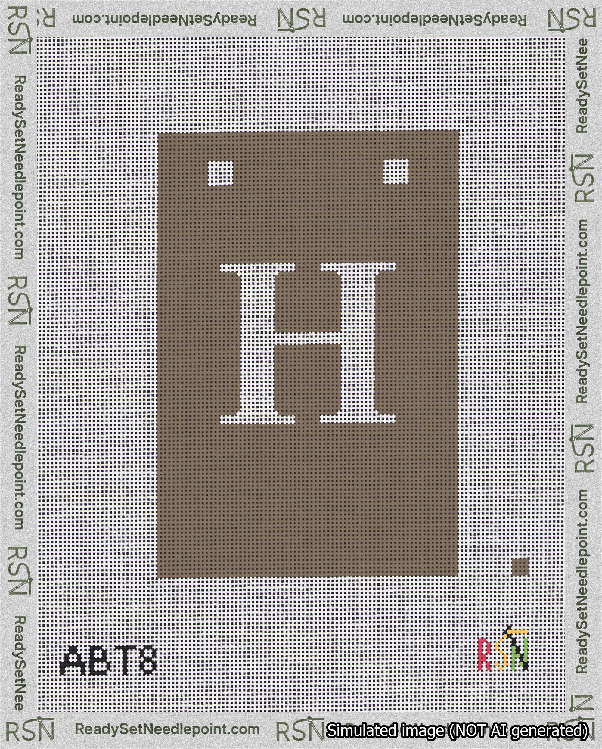 A taped needlepoint canvas with the design: Banner 18 mesh count Squared H White on Brown.