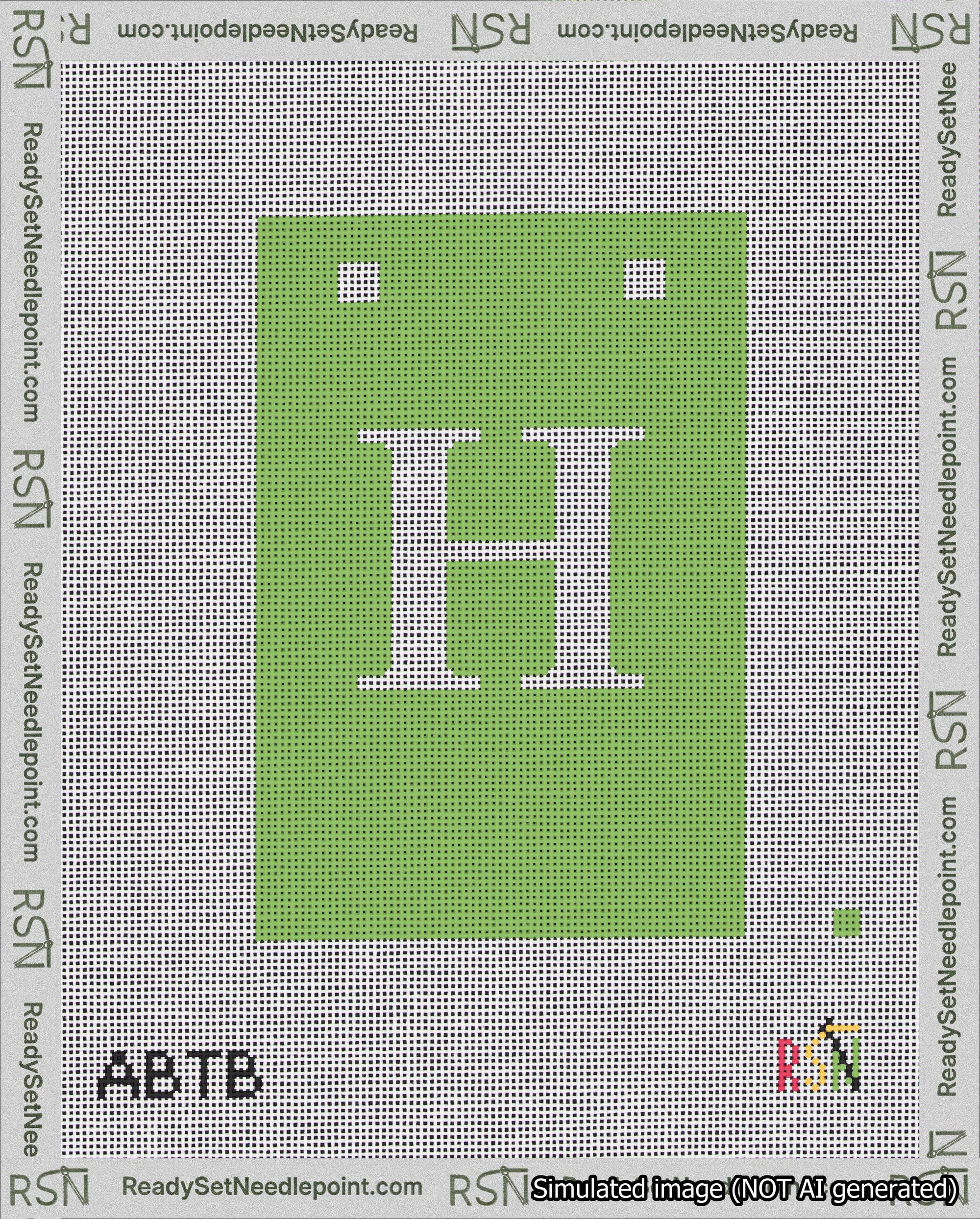 A taped needlepoint canvas with the design: Banner 18 mesh count Squared H White on Light Green.