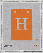 A taped needlepoint canvas with the design: Banner 18 mesh count Squared H White on Orange.