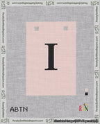 A taped needlepoint canvas with the design: Banner 18 mesh count Squared I Black on Pink.