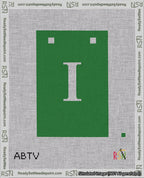 A taped needlepoint canvas with the design: Banner 18 mesh count Squared I White on Green.