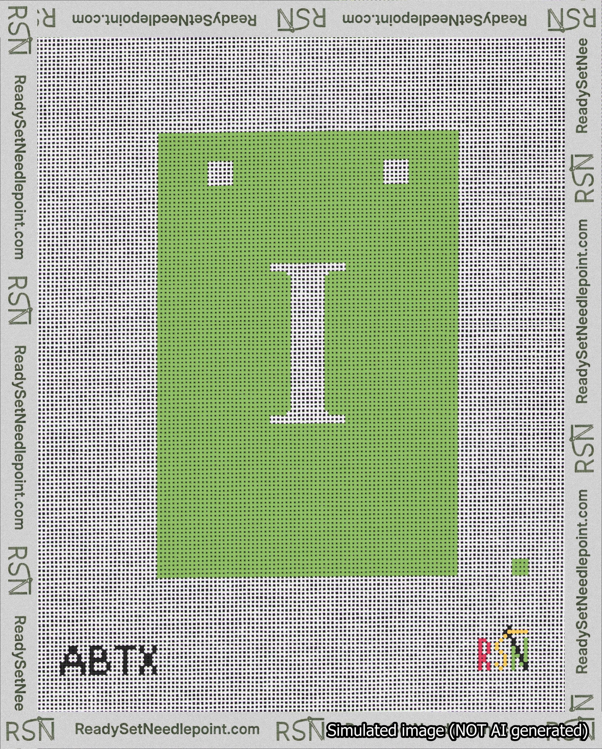A taped needlepoint canvas with the design: Banner 18 mesh count Squared I White on Light Green.