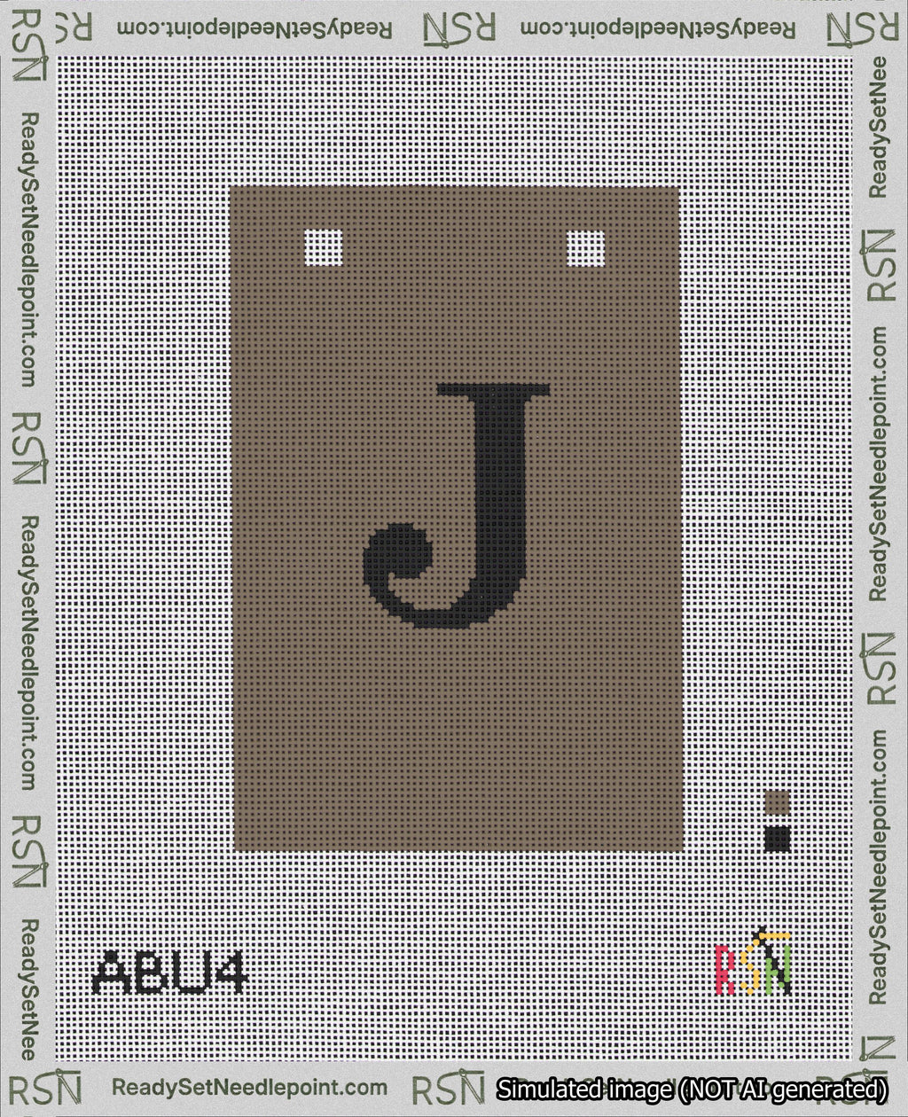 A taped needlepoint canvas with the design: Banner 18 mesh count Squared J Black on Brown.