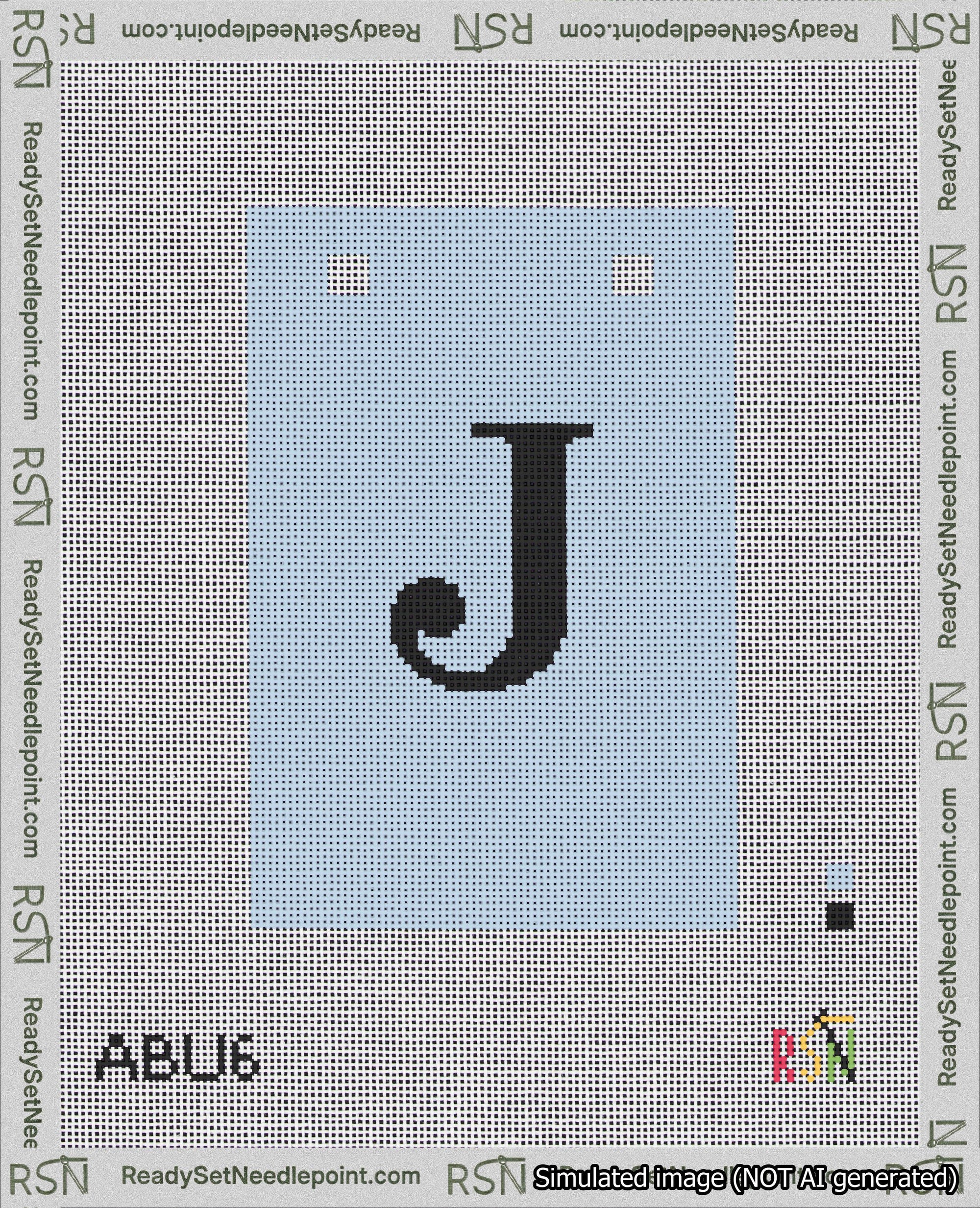A taped needlepoint canvas with the design: Banner 18 mesh count Squared J Black on Light Blue.