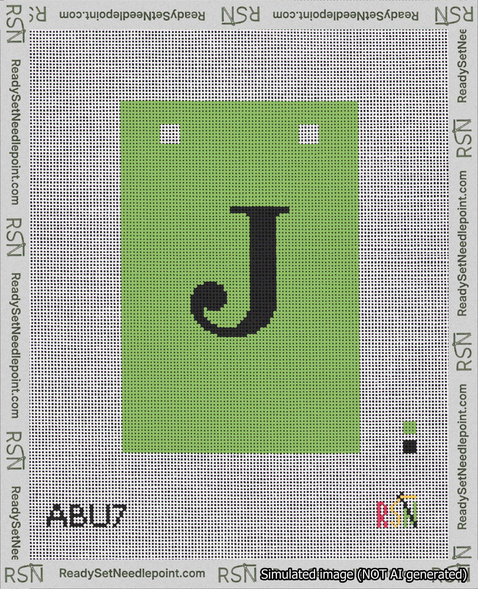 A taped needlepoint canvas with the design: Banner 18 mesh count Squared J Black on Light Green.