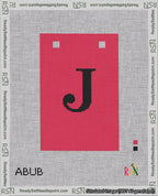 A taped needlepoint canvas with the design: Banner 18 mesh count Squared J Black on Red.