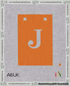 A taped needlepoint canvas with the design: Banner 18 mesh count Squared J White on Orange.
