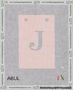 A taped needlepoint canvas with the design: Banner 18 mesh count Squared J White on Pink.