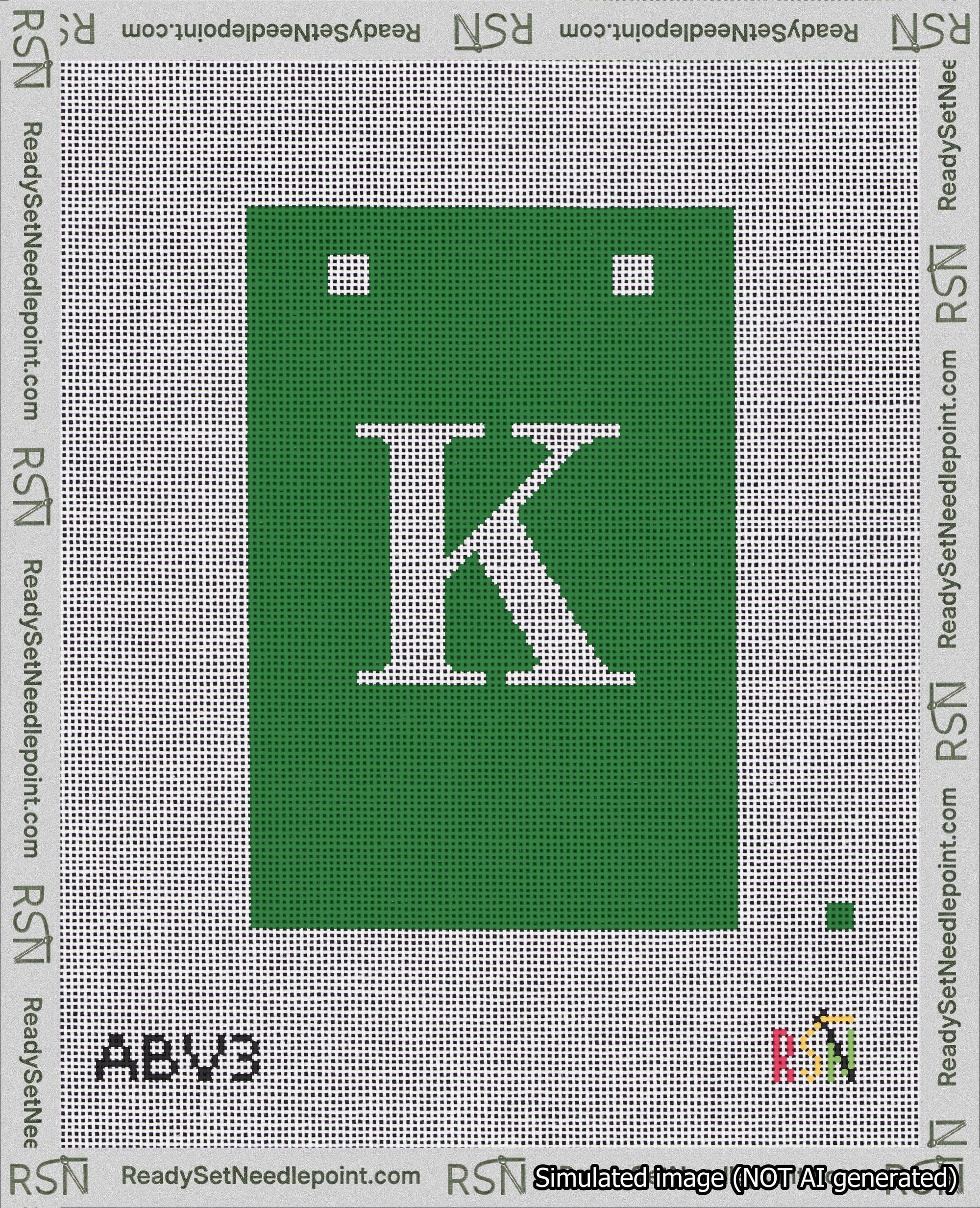 A taped needlepoint canvas with the design: Banner 18 mesh count Squared K White on Green.