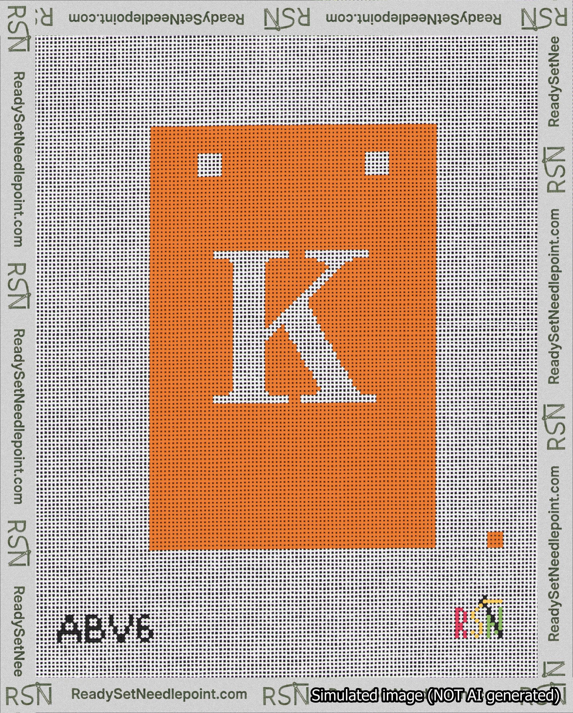 A taped needlepoint canvas with the design: Banner 18 mesh count Squared K White on Orange.