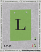A taped needlepoint canvas with the design: Banner 18 mesh count Squared L Black on Light Green.