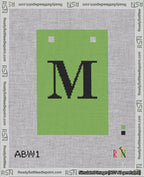 A taped needlepoint canvas with the design: Banner 18 mesh count Squared M Black on Light Green.