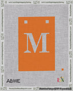 A taped needlepoint canvas with the design: Banner 18 mesh count Squared M White on Orange.