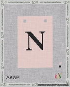 A taped needlepoint canvas with the design: Banner 18 mesh count Squared N Black on Pink.