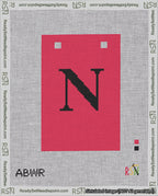 A taped needlepoint canvas with the design: Banner 18 mesh count Squared N Black on Red.