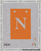 A taped needlepoint canvas with the design: Banner 18 mesh count Squared N White on Orange.