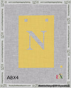 A taped needlepoint canvas with the design: Banner 18 mesh count Squared N White on Yellow.