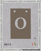 A taped needlepoint canvas with the design: Banner 18 mesh count Squared O White on Brown.