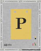A taped needlepoint canvas with the design: Banner 18 mesh count Squared P Black on Yellow.