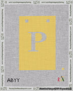 A taped needlepoint canvas with the design: Banner 18 mesh count Squared P White on Yellow.