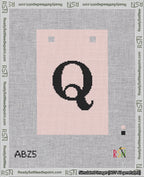 A taped needlepoint canvas with the design: Banner 18 mesh count Squared Q Black on Pink.