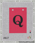 A taped needlepoint canvas with the design: Banner 18 mesh count Squared Q Black on Red.