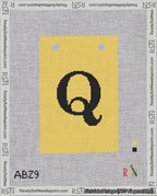 A taped needlepoint canvas with the design: Banner 18 mesh count Squared Q Black on Yellow.