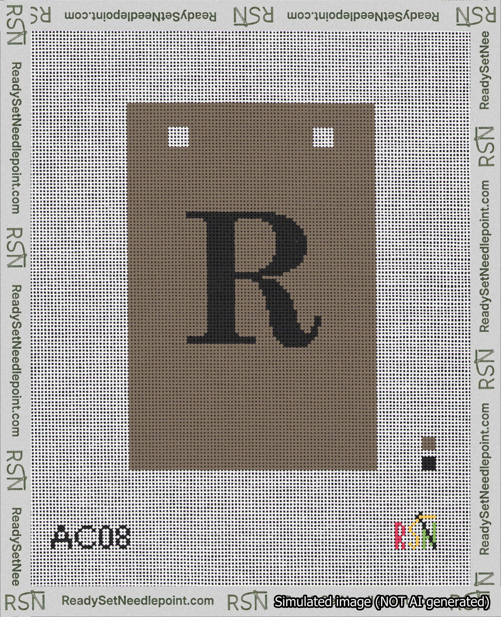 A taped needlepoint canvas with the design: Banner 18 mesh count Squared R Black on Brown.