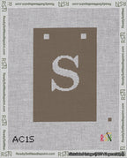 A taped needlepoint canvas with the design: Banner 18 mesh count Squared S White on Brown.
