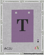 A taped needlepoint canvas with the design: Banner 18 mesh count Squared T Black on Purple.