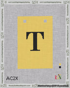 A taped needlepoint canvas with the design: Banner 18 mesh count Squared T Black on Yellow.