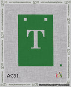 A taped needlepoint canvas with the design: Banner 18 mesh count Squared T White on Green.