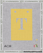A taped needlepoint canvas with the design: Banner 18 mesh count Squared T White on Yellow.