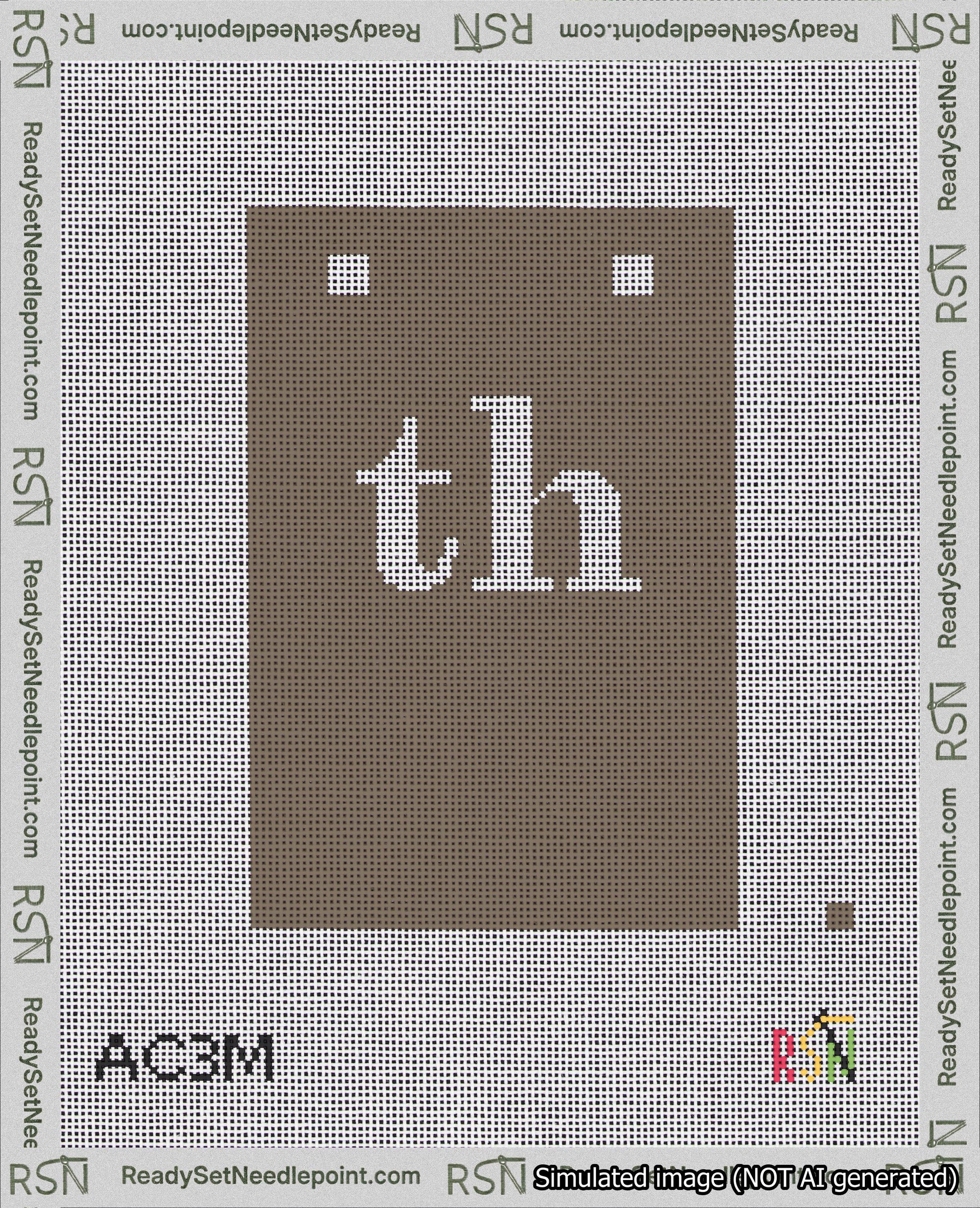 A taped needlepoint canvas with the design: Banner 18 mesh count Squared th White on Brown.
