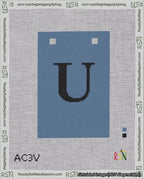 A taped needlepoint canvas with the design: Banner 18 mesh count Squared U Black on Blue.