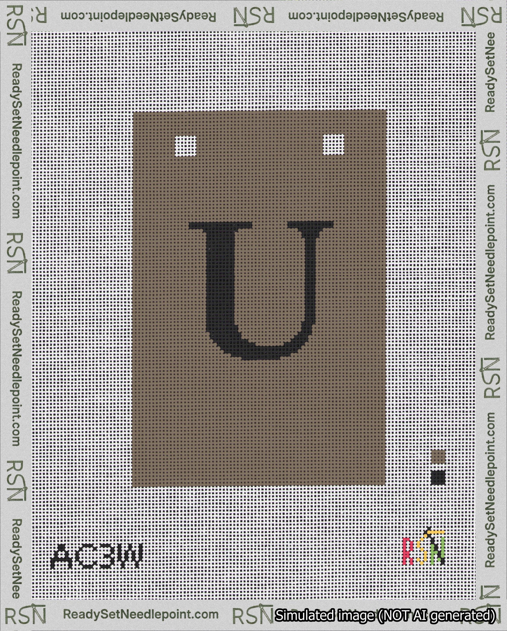 A taped needlepoint canvas with the design: Banner 18 mesh count Squared U Black on Brown.