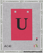 A taped needlepoint canvas with the design: Banner 18 mesh count Squared U Black on Red.