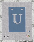 A taped needlepoint canvas with the design: Banner 18 mesh count Squared U White on Blue.