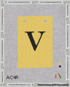 A taped needlepoint canvas with the design: Banner 18 mesh count Squared V Black on Yellow.