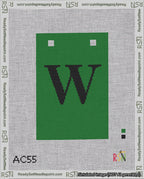 A taped needlepoint canvas with the design: Banner 18 mesh count Squared W Black on Green.