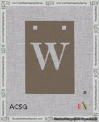 A taped needlepoint canvas with the design: Banner 18 mesh count Squared W White on Brown.