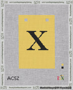 A taped needlepoint canvas with the design: Banner 18 mesh count Squared X Black on Yellow.