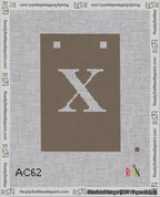 A taped needlepoint canvas with the design: Banner 18 mesh count Squared X White on Brown.