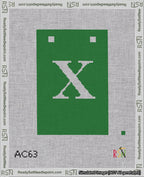 A taped needlepoint canvas with the design: Banner 18 mesh count Squared X White on Green.