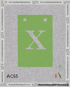 A taped needlepoint canvas with the design: Banner 18 mesh count Squared X White on Light Green.